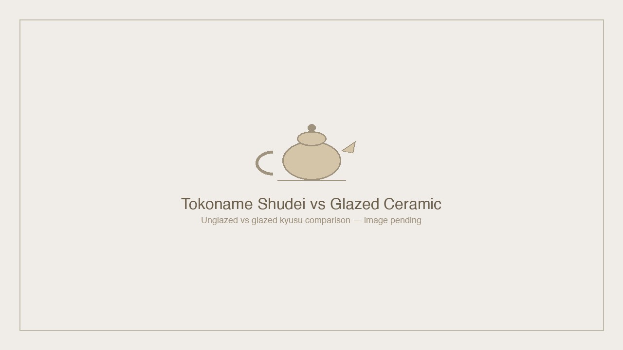 Two kyusu teapots: unglazed reddish-brown Tokoname left, glazed pale-cream right